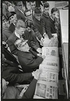 People Crowding Newsstand with All NY Papers After Strike