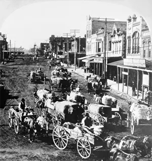 Town Scene Prints: People Delivering Cotton on Wagons