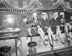 Legs Crossed Prints: People Drinking Champagne at New Year Celebration