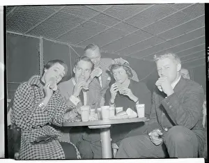 Prints of (Original Caption). Debutantes and escorts at play at rockaway Playland, May 24, 1950- Debutantes and their escorts eating hot dogs Hollywood's Sultry Siren – A Photographic Tribute: People Eating Hot Dogs