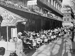 People Eating at Sidewalk Cafe