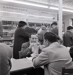 Cheese Prints: People Eating Under Swinging Hams And Ch
