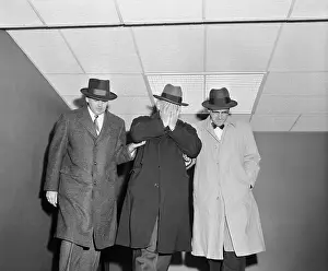 People Escorting Michael Geagan