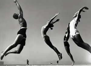 People exercising on beach (B&W)