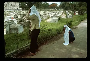 Covered Prints: People at Fence of Cemetery