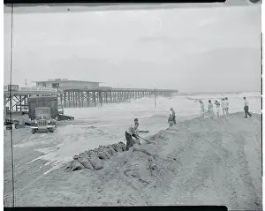 People Filling Sandbags