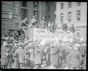 People Gathering by a Bonus Petition Truck