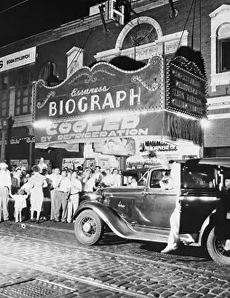 Crime Prints: People Gathering Outside Theater Entrance