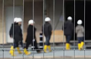 Images Dated 15th April 2012: People in hard hats and rubber boots at a construction site, Elbe Philharmonic Hall, HafenCity