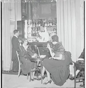 People Having Drinks in Rubber Cocktail Lounge