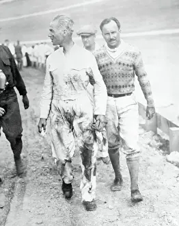 People Helping Ralph DePalma Off the Motor Track