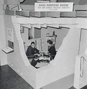 People Inside a Family Fallout Shelter