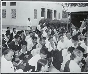 People Kneeling in Prayer