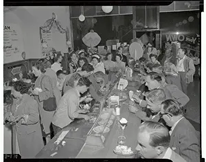 People Making and Eating Sundaes at Parlor