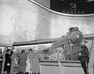 1933 Worlds Fair Prints: People Observing Steam Engine Replica