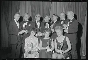 People Posing with Fashion Industry Awards