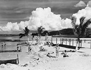 Homecoming Prints: People Relaxing On Beach