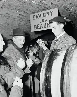 People Sampling Wine