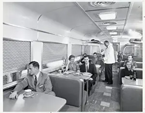 Booth Prints: People Seated in Dining Car of Train