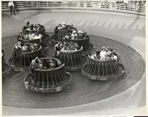 Amusement Park Prints: People on Spinning Amusement Ride