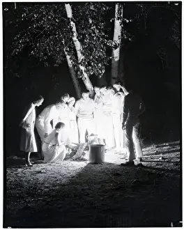 Stove Prints: People Standing a Campfire