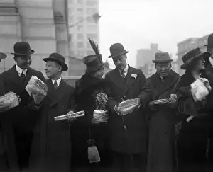 Warm Clothing Prints: People standing in line holding letters