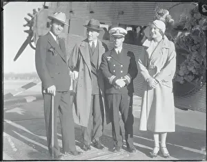 People Standing in Front of Plane