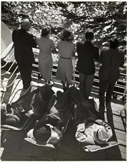 Cruise Prints: People Standing & Seated on Ship Deck