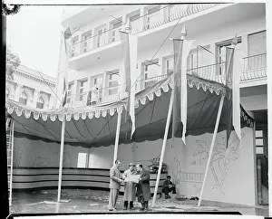 Monaco Prints: People Standing Underneath an Awning