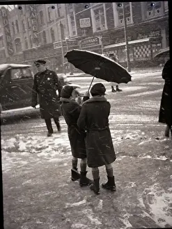 Trenton Prints: People Standing on a Wintery Street