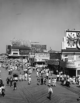 People Strolling Along Atlantic City Boardwalk