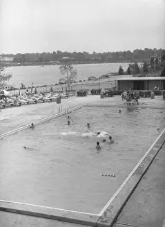 Holiday Maker Prints: People swimming in outdoor pool, (B&W), elevated view