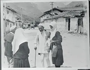 People Talking on a Street