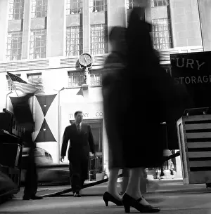 Prints of New York, NY - 1957: People and vehicles in front of the famous Tiffany and Co. storefront, at 5th Avenue and 57th Street, in 1957 in New York City, New York Portraits, Artworks, and Montages from a Visionary Photographer: People In Front of Tiffany & Co. in 1957