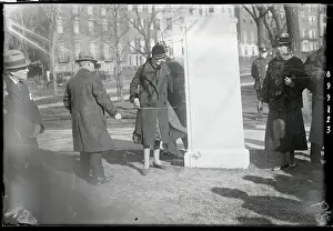 People Unveiling a Football Tablet