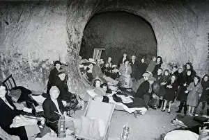 People Use Caves For Air Raid Shelter