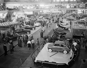 People Viewing Cars on Display