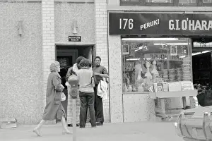 People Waiting Outside of a Clinic