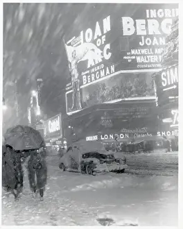 Blizzard Prints: People Walking on City Street During Snowstorm