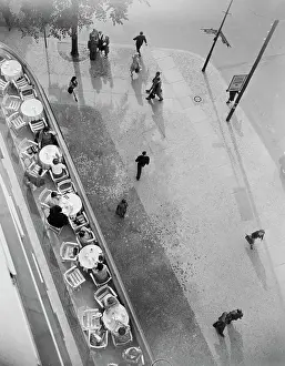 Sidewalk Cafe Prints: People Walking Past a Sidewalk Cafe