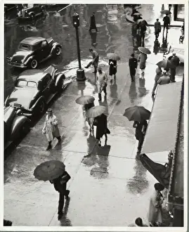 Gloomy Prints: People Walking in the Rain