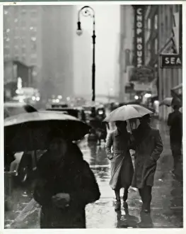 Gloomy Prints: People Walking in the Rain