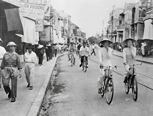 Hanoi Prints: People Walking and Riding Bicycles in Hanoi