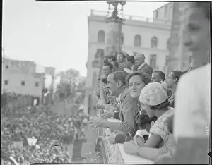 People Watching Parade from Balcony