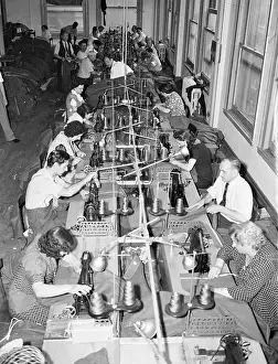 Sewing Prints: People Working In Clothing Factory