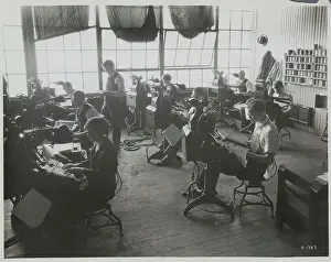 People Working on Monotype Manchines