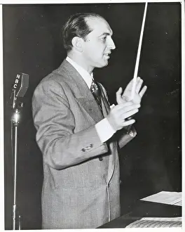 Percy Faith Conducting Orchestra on Set