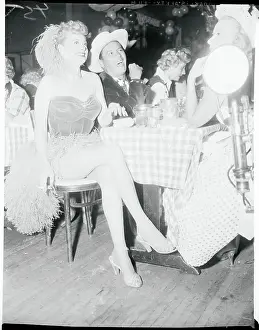 Performer Lucille Ball and Desi Arnaz Sitting With Friends at Health Event