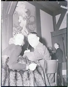 Prints of (Original Caption). Lucille Ball, the blonde comedienne, and Al Hall, Director, were snapped here at Ray Haller's Cafe, a Hollywood night spot Behind the Laughter: Lucille Ball's Unseen Moments: Performer Lucille Ball Sitting at Table With Movie Man Al Hall