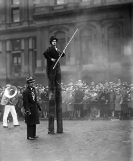 Crutches Prints: Performer on stilts